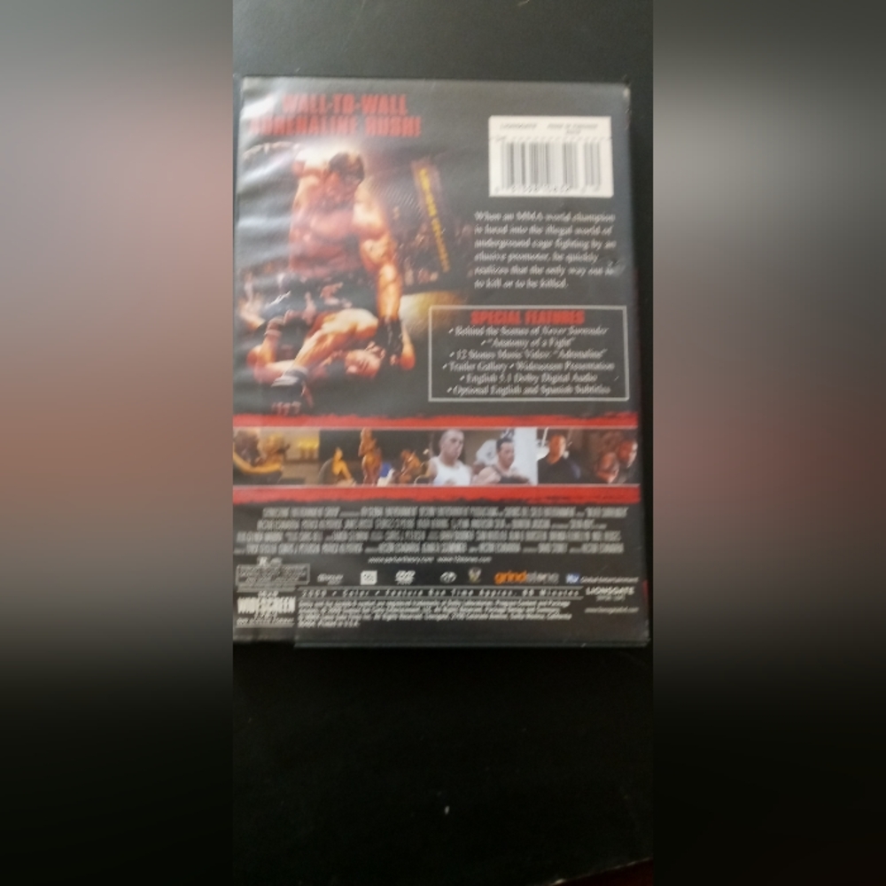 Never Surrender DVD — Red & Black Cover - Picture 2 of 5